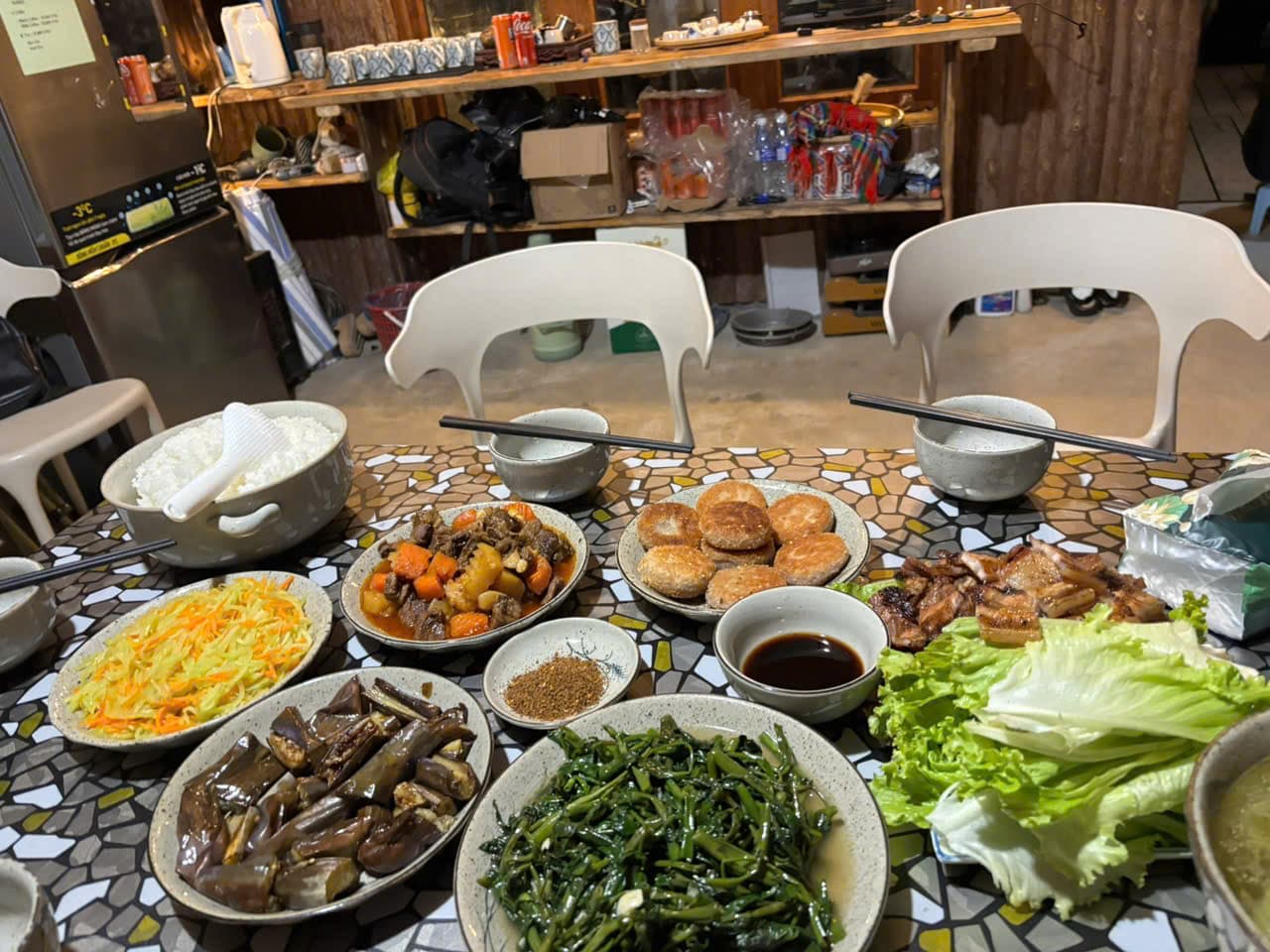 A shared meal at the homestay table